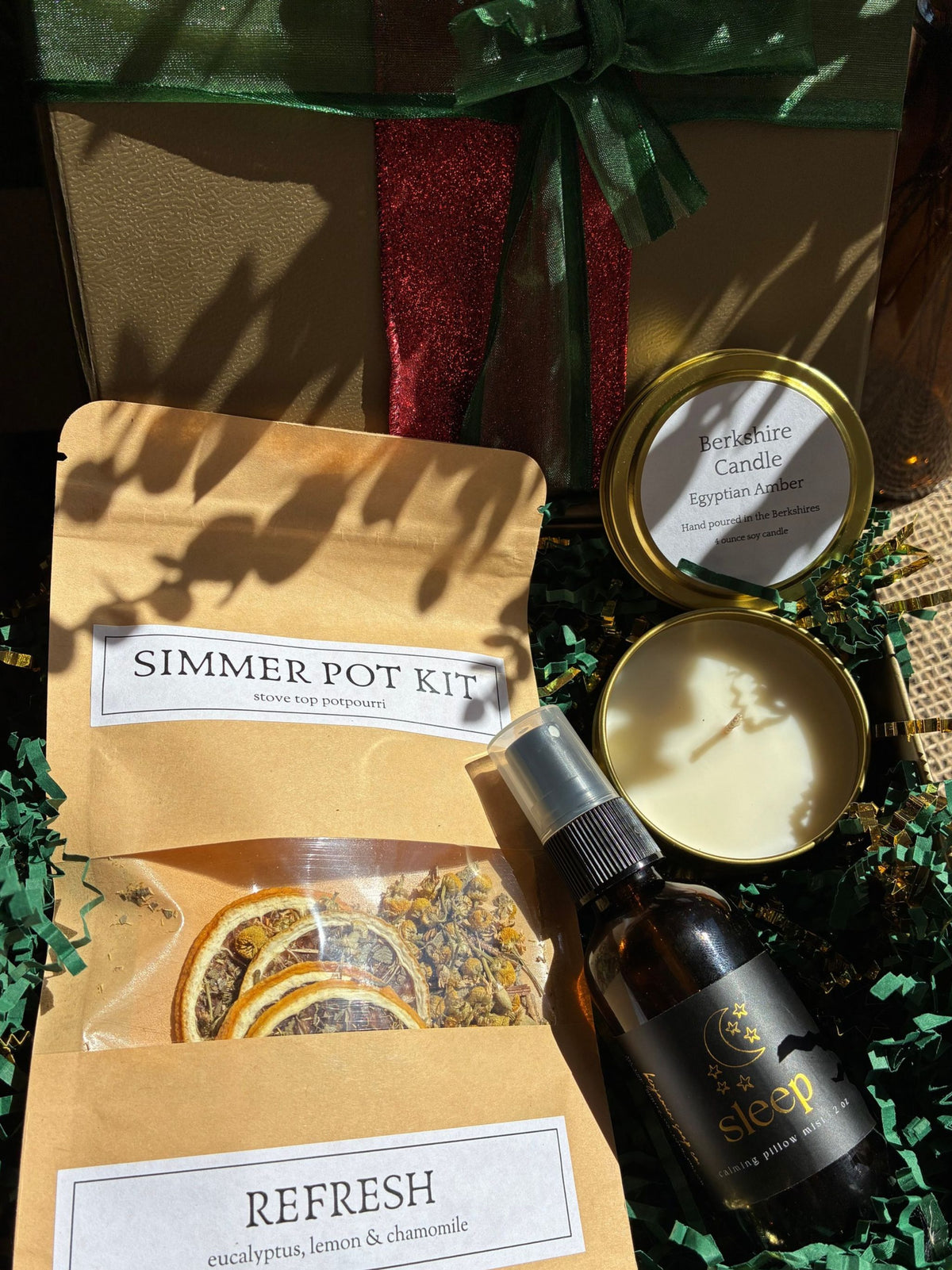 Self-Care Gift Box for a holiday gift with candle, pillow spray and simmer pot kit in holiday wrapping